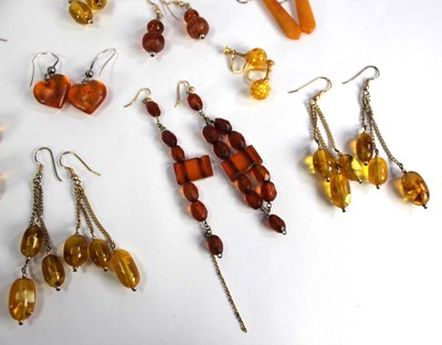 Lot 777 - Thirteen pairs of amber-type ear pendants (13...