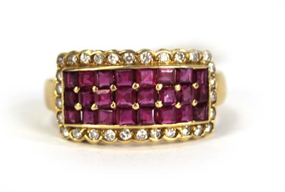 Lot 781 - An 18ct yellow gold ring set three rows of...