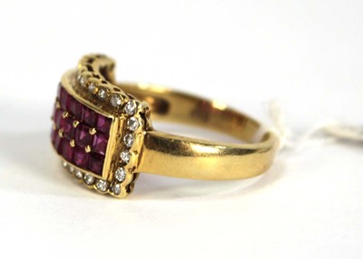 Lot 781 - An 18ct yellow gold ring set three rows of...