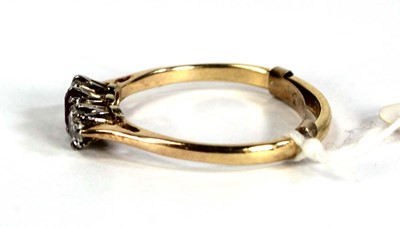 Lot 782 - An 18ct yellow gold ring set small ruby and...