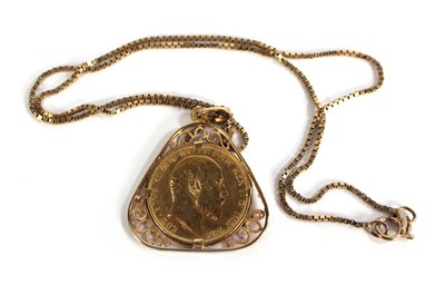 Lot 404 - A 9ct yellow gold boxlink necklace suspending...