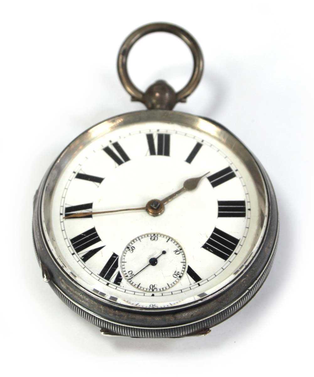 Lot 423 - A silver open face pocket watch, the white...