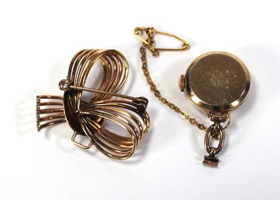 Lot 426 - A gold plated nurses-type watch by Fortis, the...