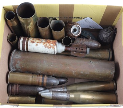 Lot 1384 - Box of assorted brass shell cases and heads,...