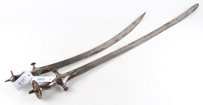 Lot 1387 - Two Talwar swords, 25 ins and 35 ins blades