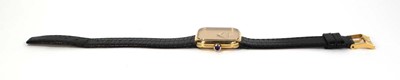 Lot 460 - An 18ct yellow gold wristwatch by Baume &...