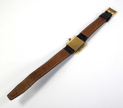 Lot 460 - An 18ct yellow gold wristwatch by Baume &...