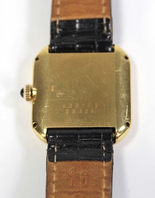 Lot 460 - An 18ct yellow gold wristwatch by Baume &...