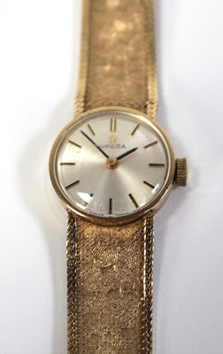 Lot 465 - A ladies 9ct yellow gold wristwatch by Omega,...