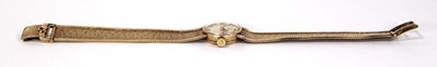 Lot 465 - A ladies 9ct yellow gold wristwatch by Omega,...