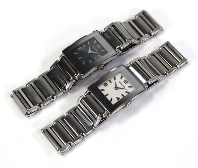 Lot 467 - A pair of ladies day/night stainless steel...