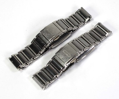 Lot 467 - A pair of ladies day/night stainless steel...