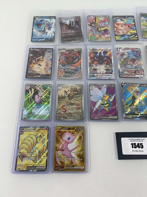Lot 1545 - Approx. 25 Top Loaded Pokémon cards from...