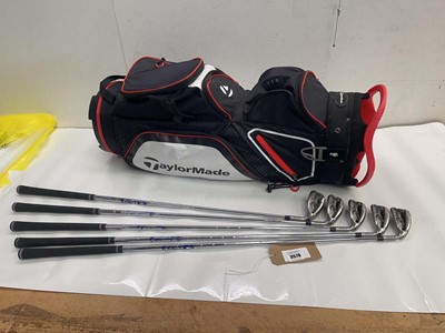 Lot 3578 - TaylorMade gold club bag and set of 5 ping...