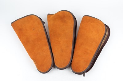 Lot 1390 - Three suede fleece-lined pistol cases