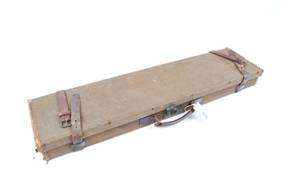 Lot 1479 - Canvas and leather gun case, interior fitted...