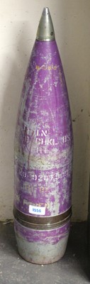 Lot 1556 - A large inert practice round artillery shell,...