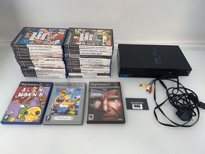 Lot 1085 - Sony PlayStation 2 with qty of games to...