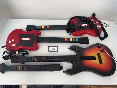 Lot 1086 - 2x Sony PlayStation 2 Guitar Hero controllers...