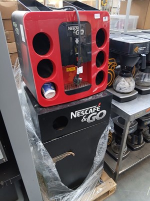 Lot 87 - Floor standing Nescafe and go instant coffee...