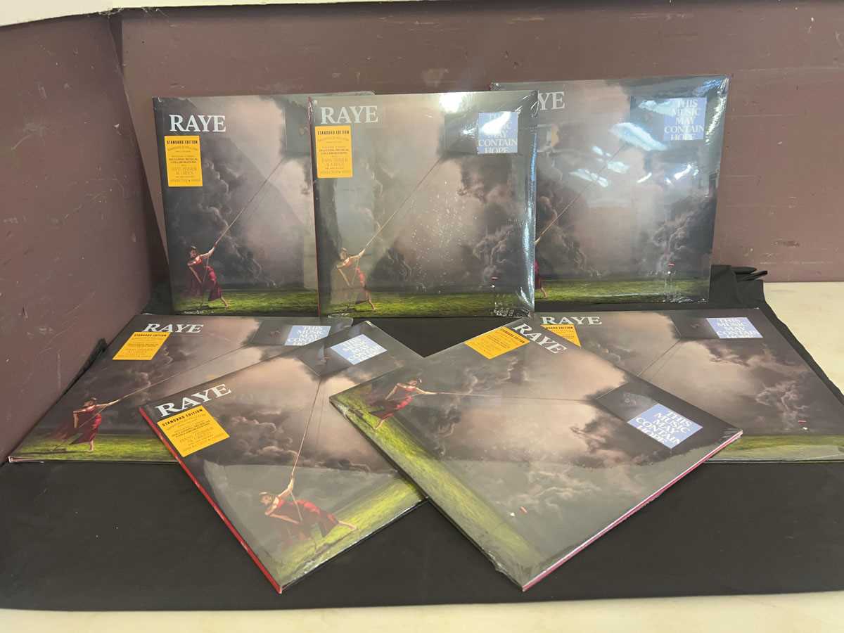 Lot Seven sealed copies of Raye - 'This Music May...