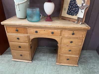 Lot 70 - A stripped pine twin pedestal desk