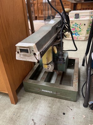 Lot 112 - A Dewalt power shop radial arm cross cut saw