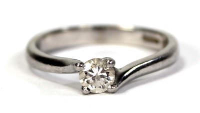 Lot 791 - A platinum ring set brilliant cut diamond in a...