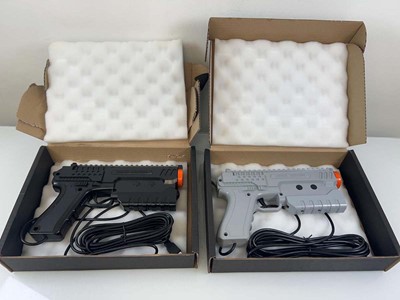 Lot 1110 - 2x Sinden Light guns with recoil