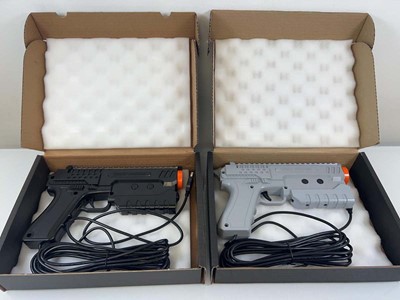 Lot 1112 - 2x Sinden Light guns 1 with recoil and 1 without