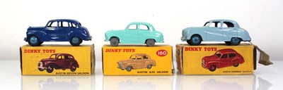 Lot 154 - Three Dinky models: 152 Austin Devon saloon,...