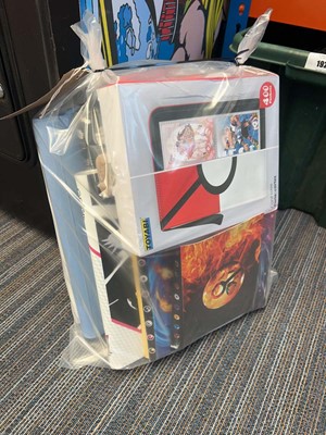 Lot 1929 - Bag containing empty Pokémon binders, plus an...