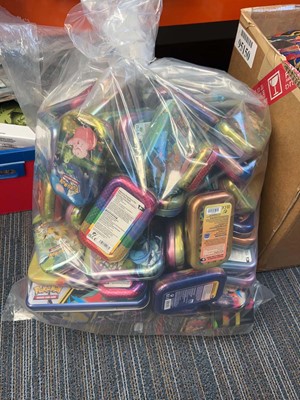 Lot 1932 - Bag containing empty Pokémon collectable tins
