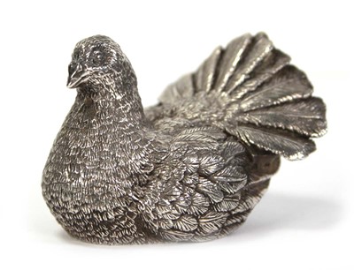 Lot 202 - A silver figure modelled as a turtle dove,...