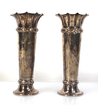 Lot 209 - A pair of silver spill vases of flared form,...