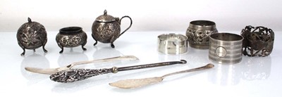 Lot 214 - A mixed group of silver comprising four napkin...