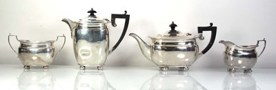 Lot 216 - An early 20th century silver four piece...