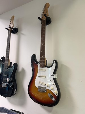 Lot 2192 - Fender Stratocaster 6 string brown and white...