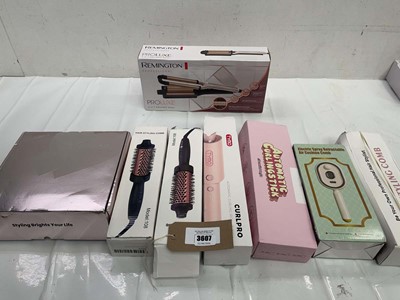 Lot 3607 - Remington prolux 4 in 1 waver, heated brushes,...