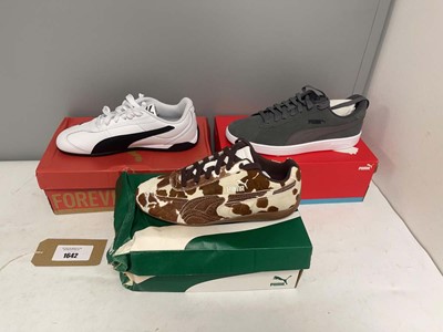 Lot 3x Boxed pairs of Puma shoes in various styles...