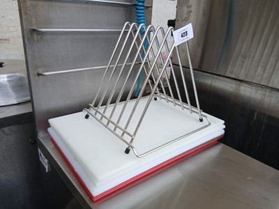 Lot 423 - 3 white and 2 coloured chopping boards with rack