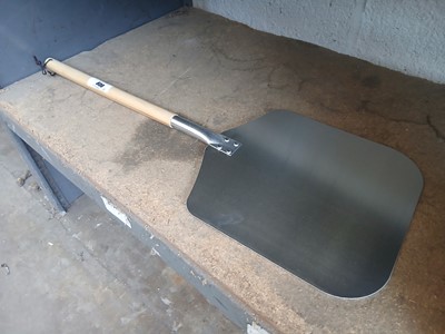 Lot 606 - Pizza peel with wooden handles