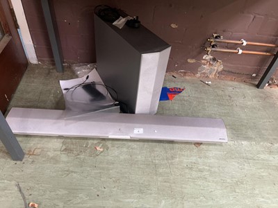 Lot 4 - A Sony sound bar and woofer with remote