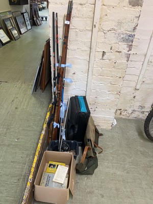 Lot 14 - A collection of fishing rods, tackle, books...