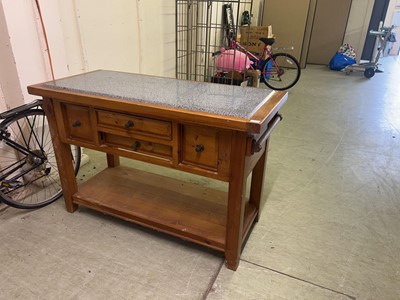 Lot 20 - An oak and marble inlaid island unit with drawers