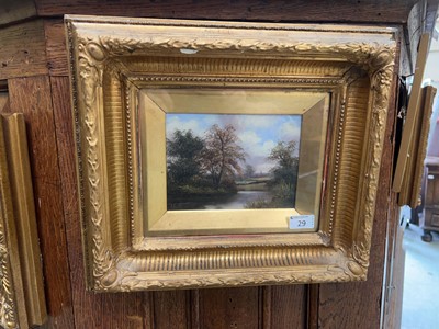 Lot 29 - An ornate framed river scene signed