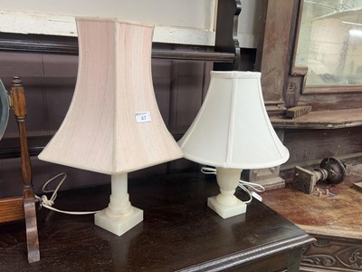Lot 47 - Two onyx based table lamps
