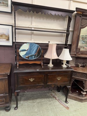 Lot 48 - An oak dresser with two drawers and plate rack...