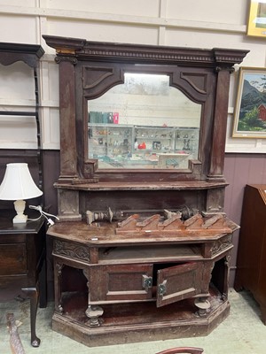 Lot 49 - A wooden sideboard with mirrored back (for...