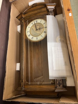 Lot 60 - A Bulova quartz pendulum wall clock in box